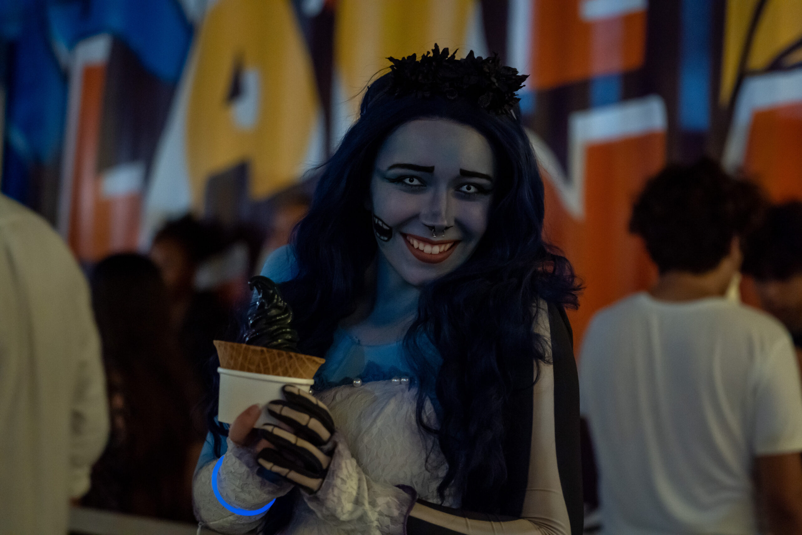 Lady in costume holding ice cream